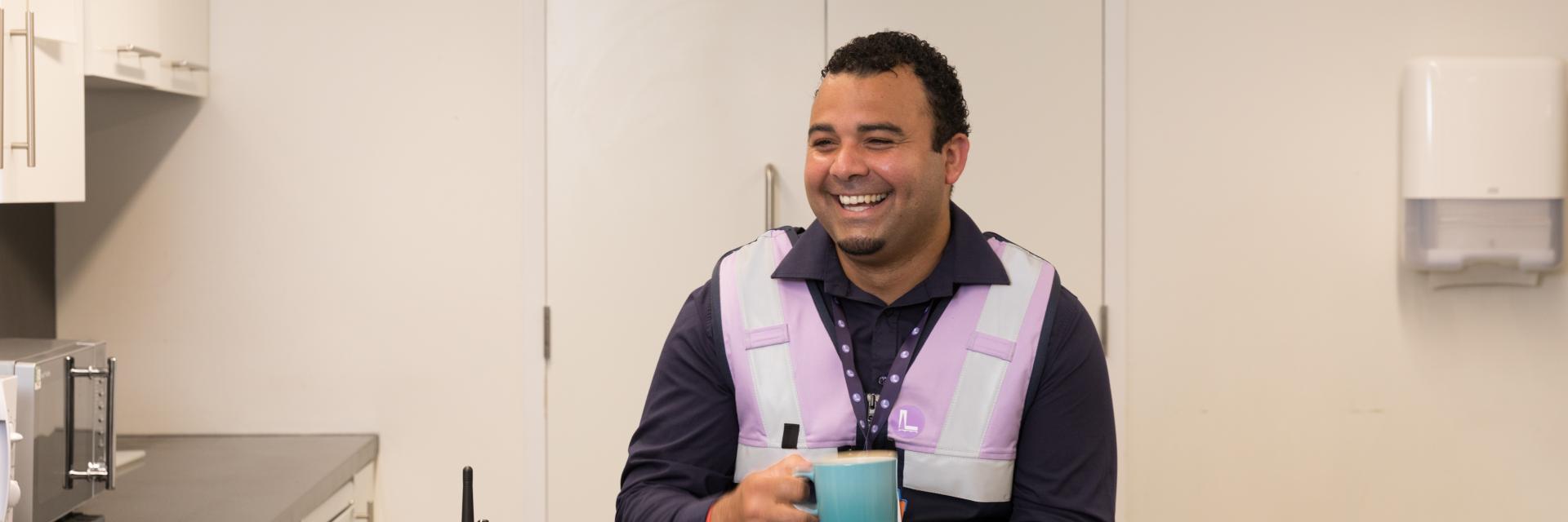 Man drinking cup of tea